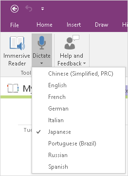 In the OneNote Desktop, the Japanese dictation option is selected under the Dictate menu.
