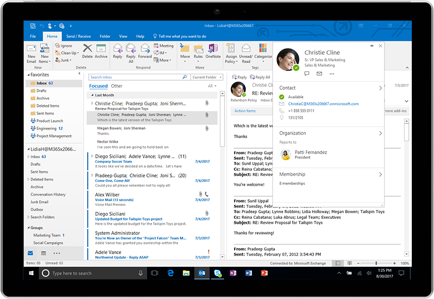Image of the new people card displayed in Outlook for Windows. Shows contact information, organization and memberships for the selected person.